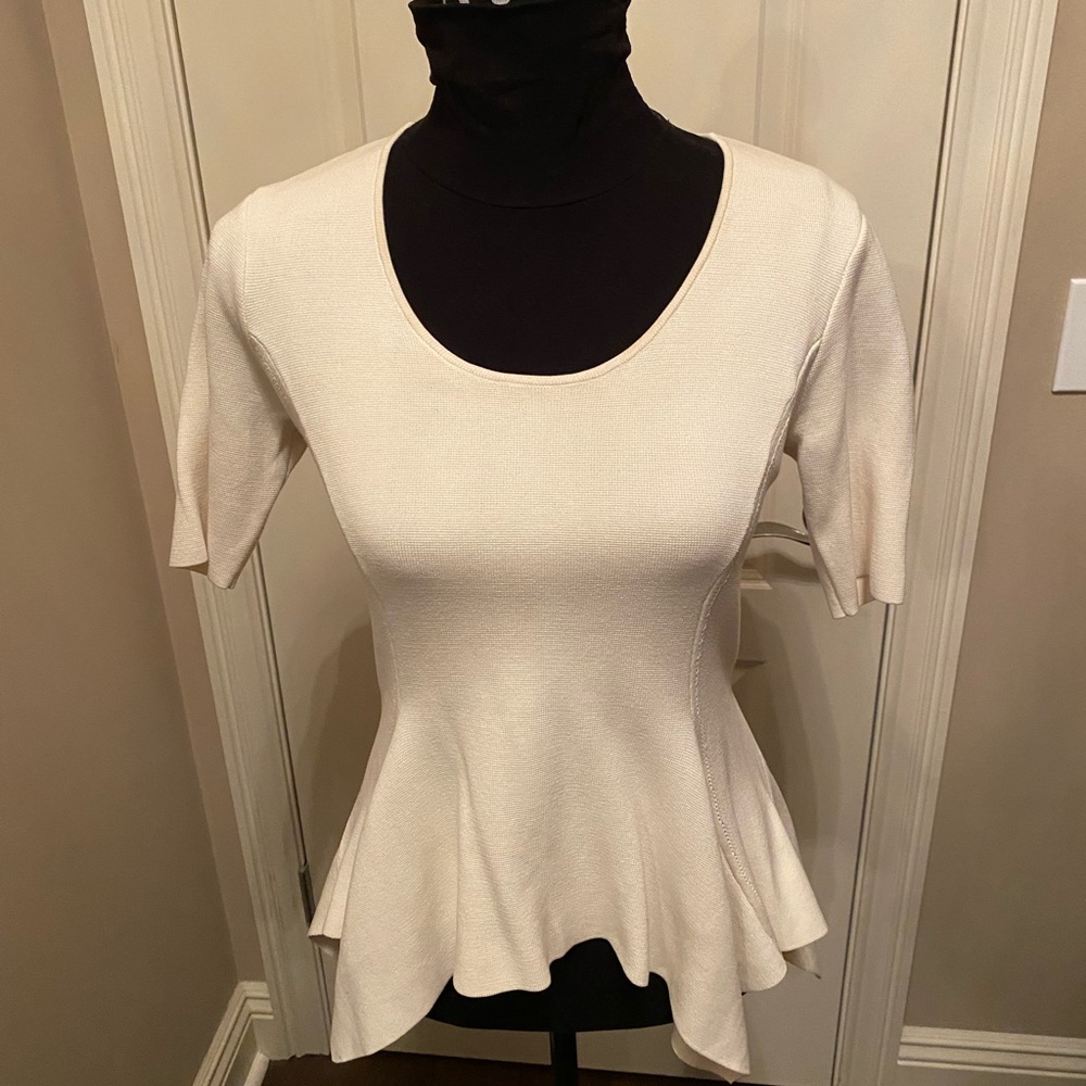 BCBGMAXAZRIA BCBG Cream peplum sweater top. SzM